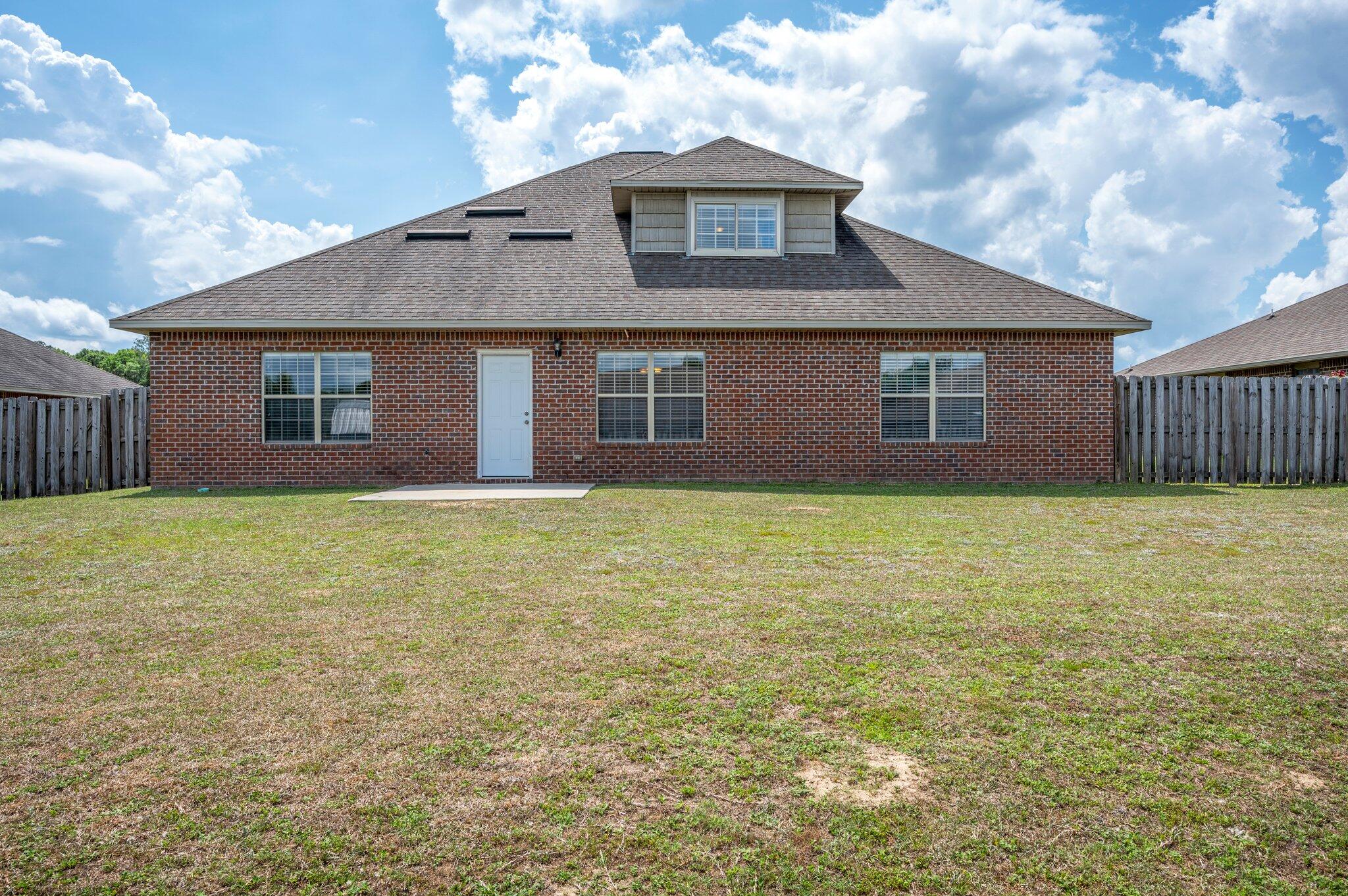 5231 Moore Loop Crestview, FL 32536 - Photo 38 of 45 a front view of house with yard