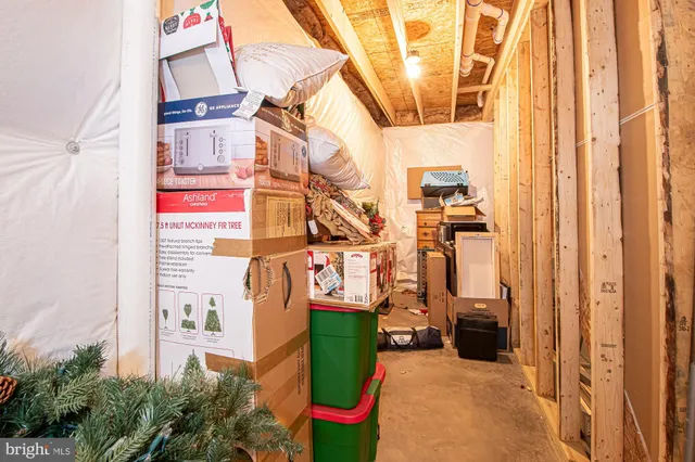 a view of living room with furniture and a window