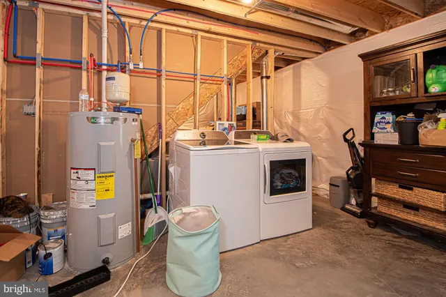 a view of a storage room with washer and dryer