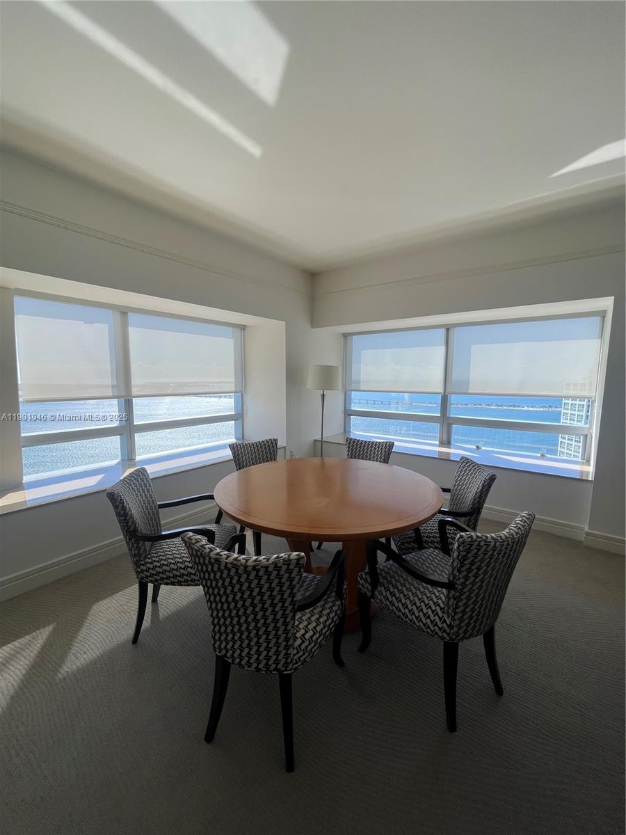 1435 Brickell Avenue, Unit 3506 Miami, FL 33131 - Photo 2 of 32 a view of a dining room with furniture and window