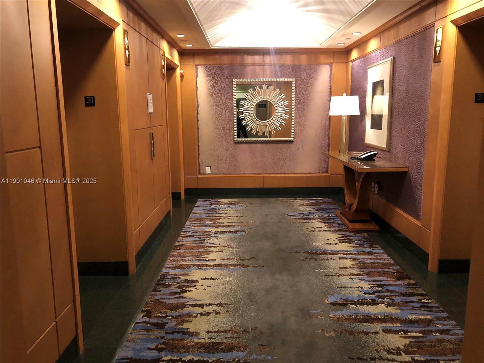 1435 Brickell Avenue, Unit 3506 Miami, FL 33131 - Photo 23 of 32 a view of an entryway with wooden floor