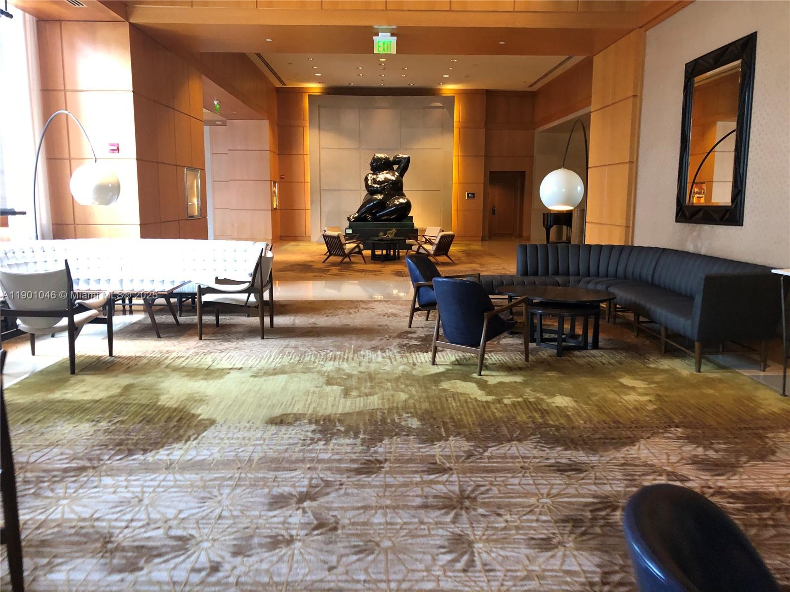 1435 Brickell Avenue, Unit 3506 Miami, FL 33131 - Photo 32 of 32 a living room filled with furniture