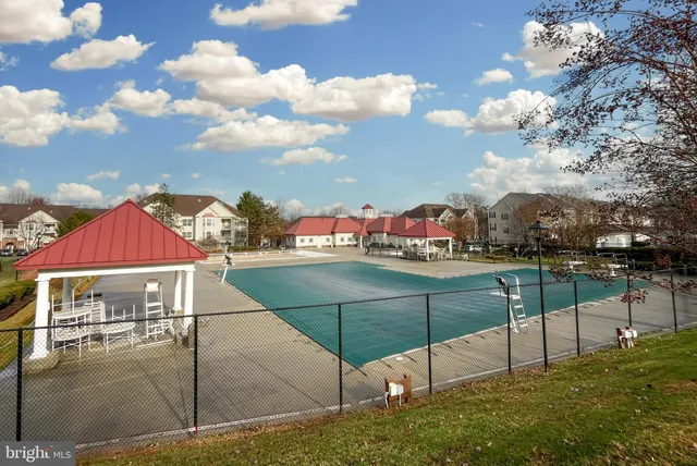 a view of a terrace with wooden fence