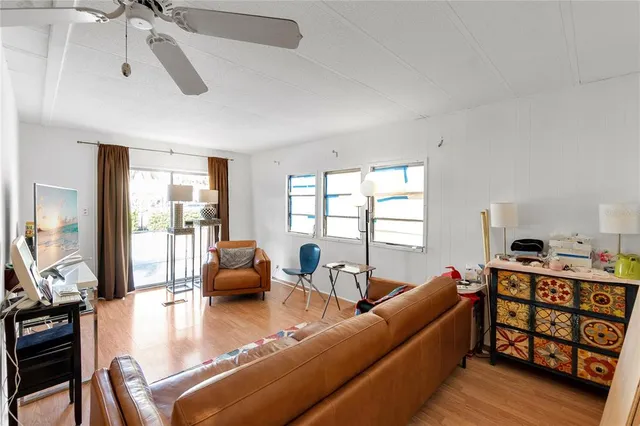 a picture of a door and a table in a kitchen