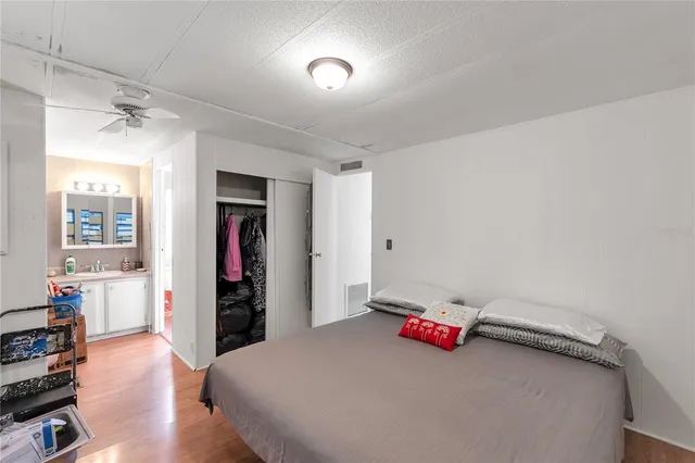 a bed room with a bed and a window