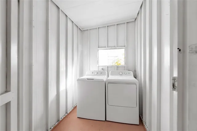 a backyard of a house with a fountain