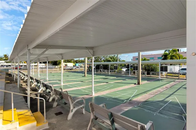 a view of a kitchen with fridge and closet