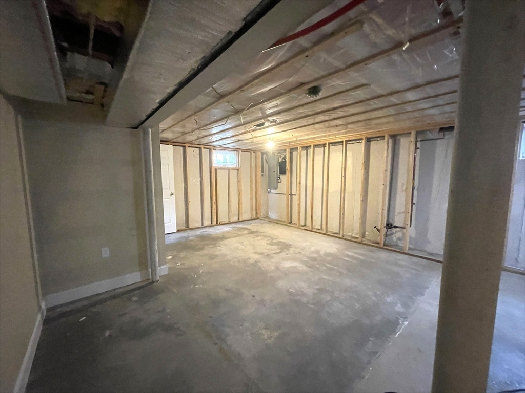 2 McAdams Road Framingham, MA 01701 - Photo 15 of 17 a view of an empty room with a window