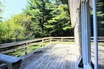 2 McAdams Road Framingham, MA 01701 - Photo 16 of 17 a view of a swimming pool with an outdoor seating