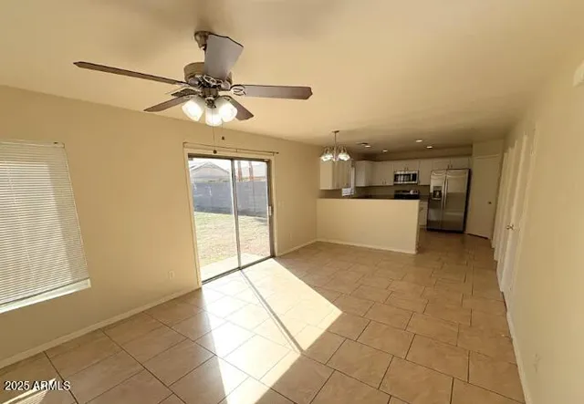 a view of a kitchen with a sink and a stove top oven