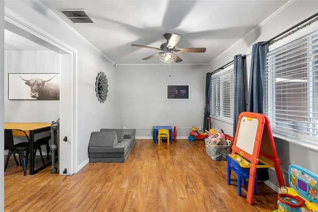 a view of a chairs and table in the patio