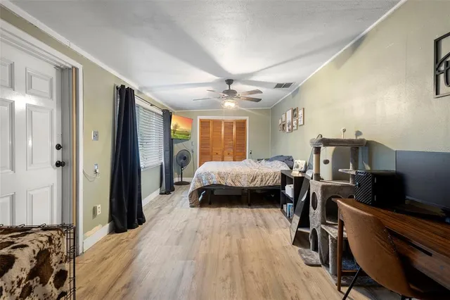 a view of living room with furniture and a rug