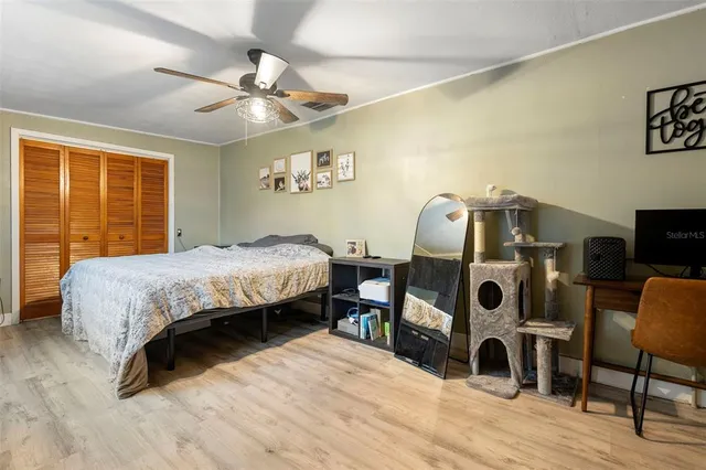 a view of a backyard with sitting area