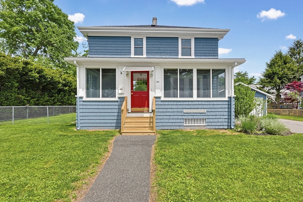 10 Water Street Natick, MA 01760 - Photo 34 of 35 a front view of a house with a yard