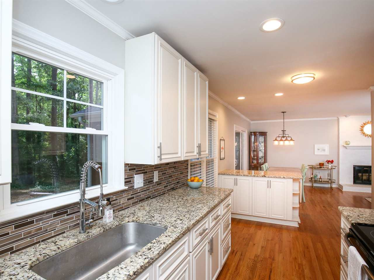 4012 Cardigan Place Raleigh, NC 27609 - Photo 30 of 30 Open floorplan from the kitchen to the family room!