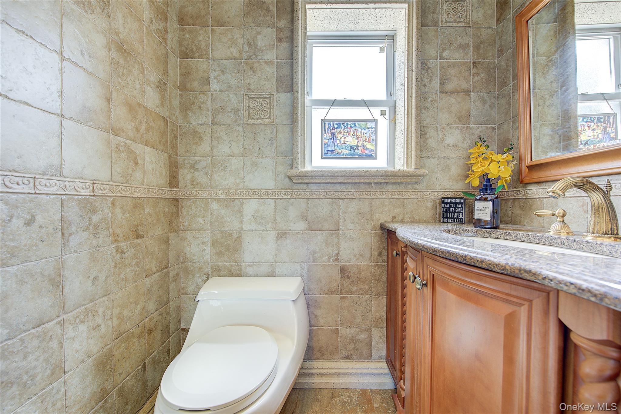 201-04 24th Road Queens, NY 11360 - Photo 13 of 50 Half bathroom on the first floor