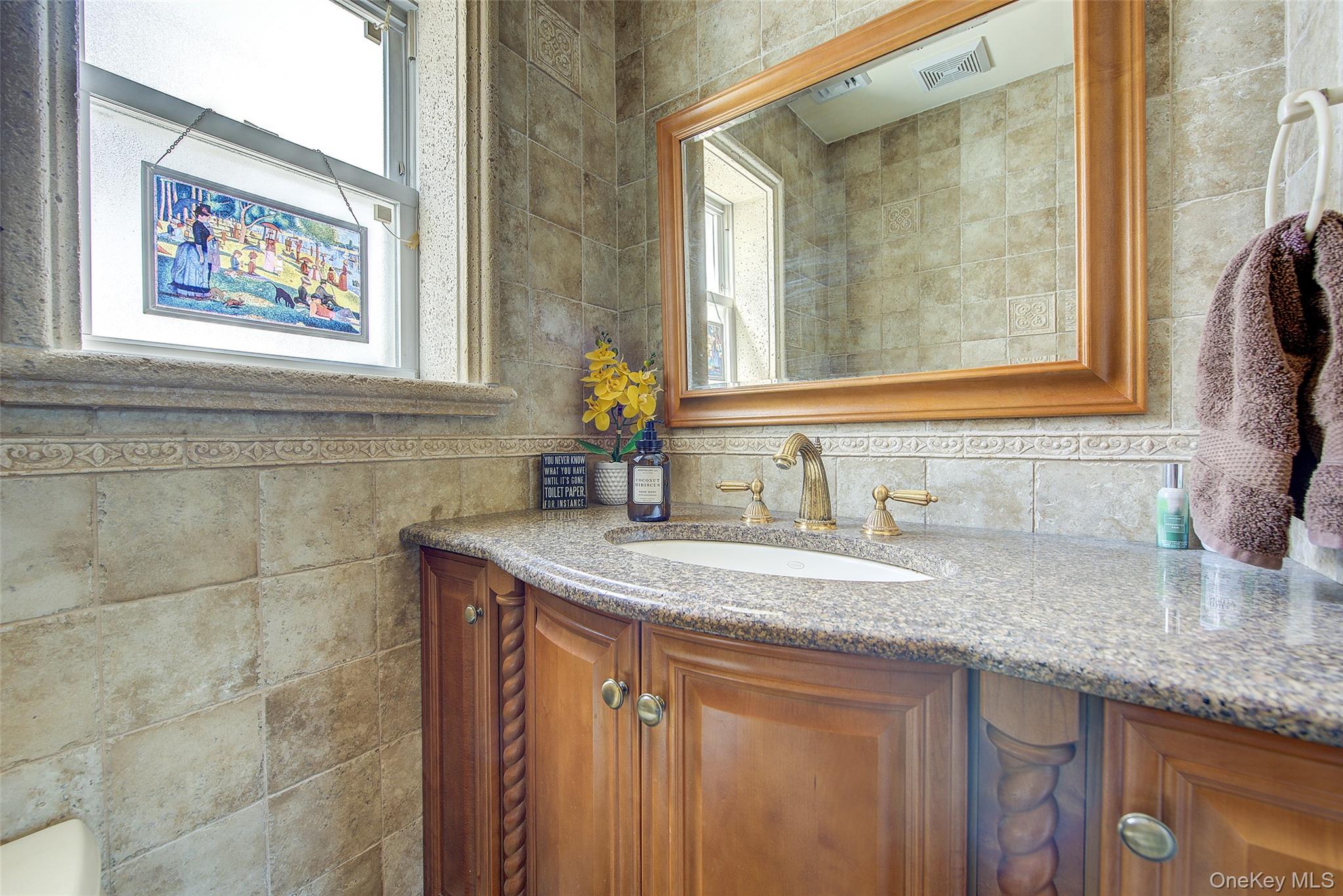 201-04 24th Road Queens, NY 11360 - Photo 14 of 50 Half bathroom on the first floor