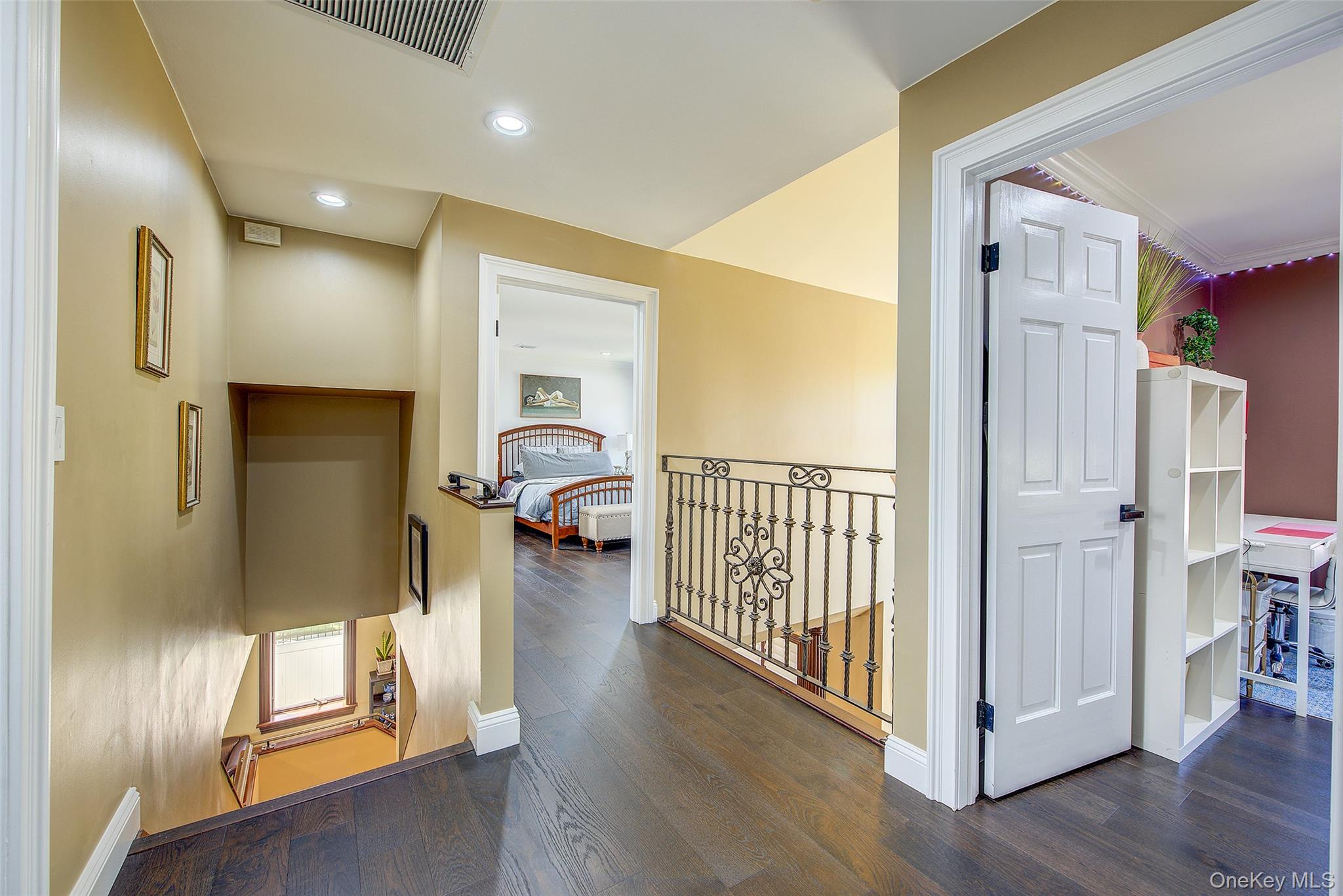 201-04 24th Road Queens, NY 11360 - Photo 29 of 50 Second floor hallway with view of two bedrooms