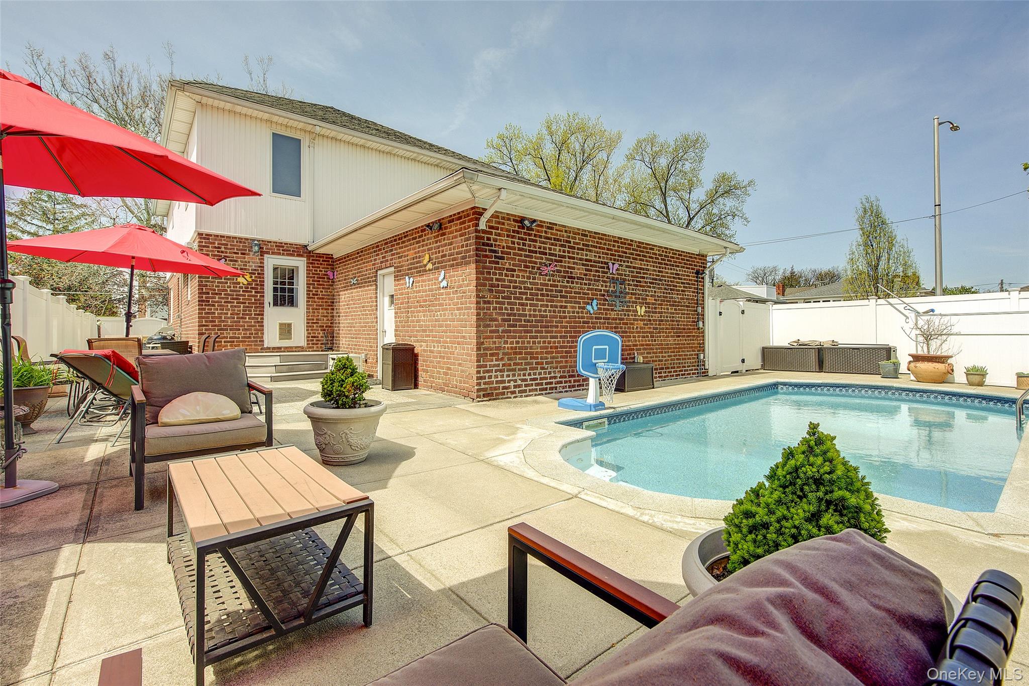 201-04 24th Road Queens, NY 11360 - Photo 47 of 50 Beautiful pool located at the rear of the home