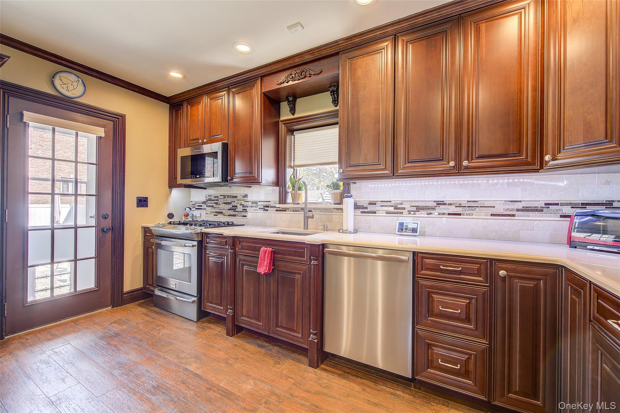 201-04 24th Road Queens, NY 11360 - Photo 9 of 50 Tons of storage and stainless steel appliances