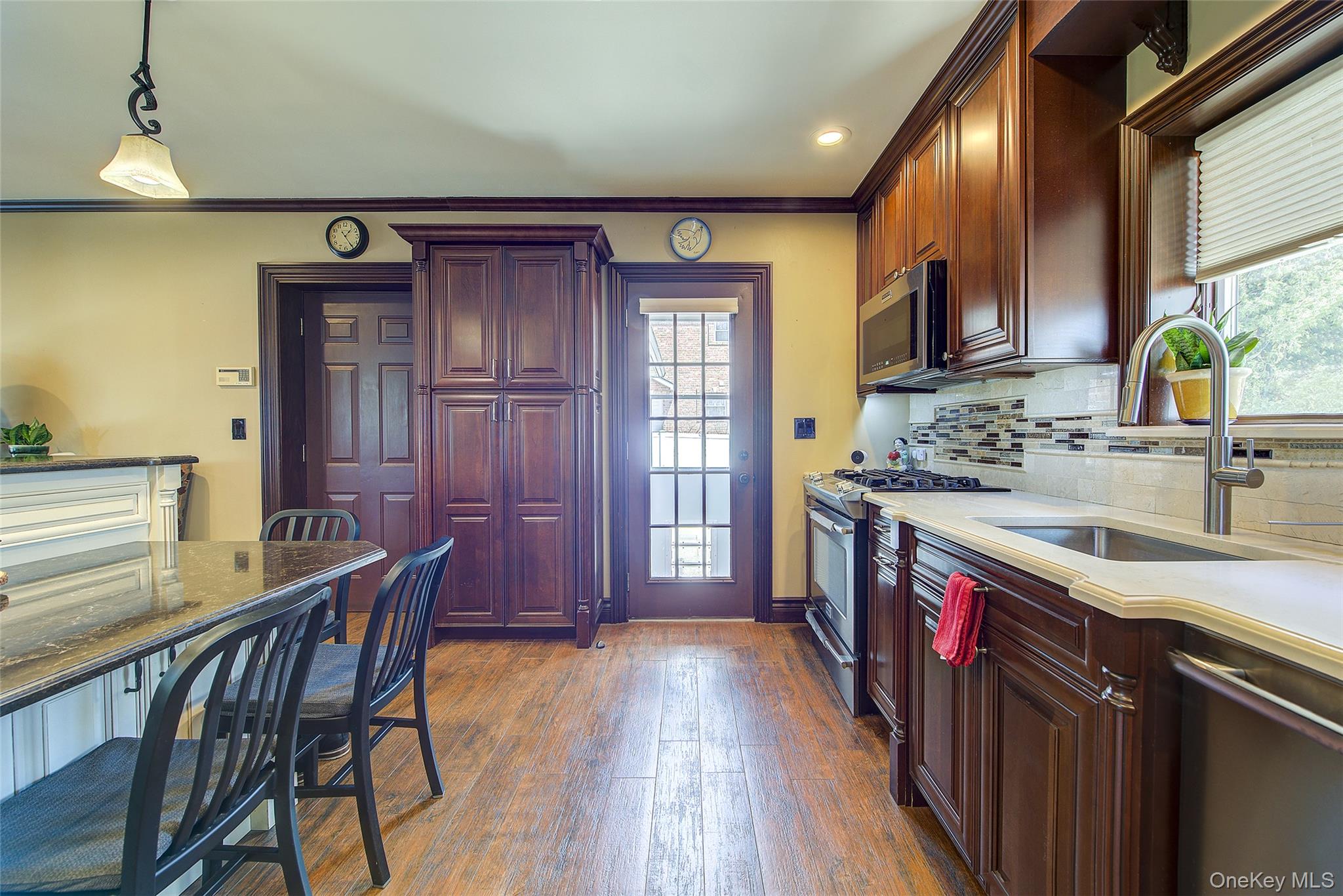 201-04 24th Road Queens, NY 11360 - Photo 10 of 50 View of French door from the kitchen