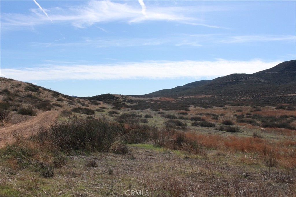 0 Grigg Winchester, CA 92596 - Photo 4 of 6 a view of a dry yard with mountains in the background