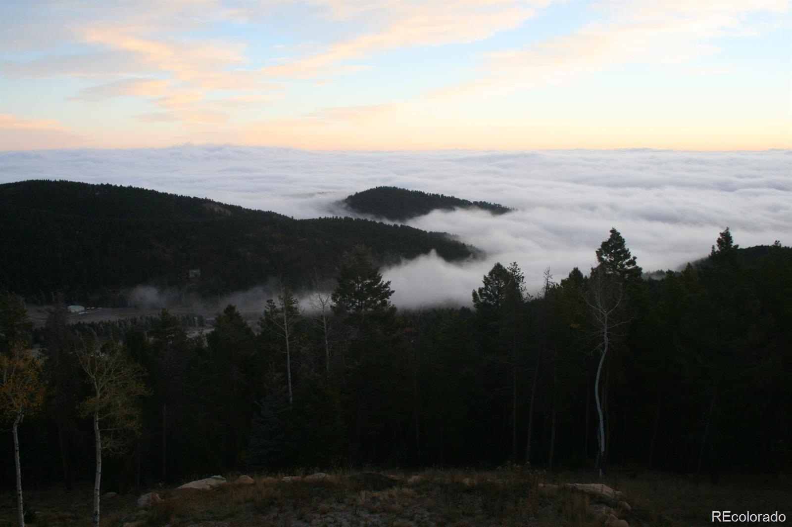 13058 South Ridge Road Conifer, CO 80433 - Photo 7 of 7 a view of lake and mountain view