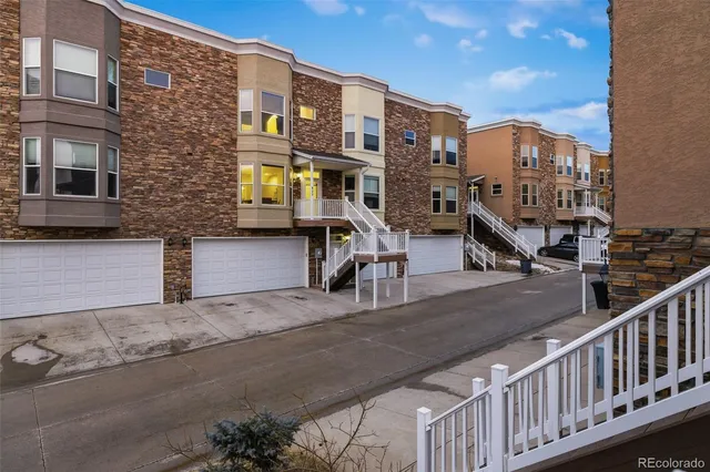 a front view of a multi story residential apartment building