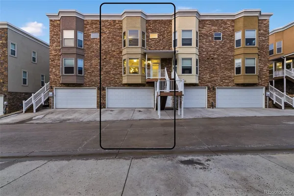 a front view of a multi story residential apartment building