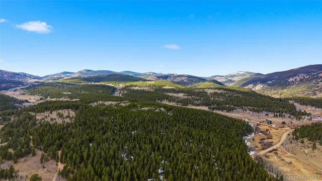 a view of a street with sitting area
