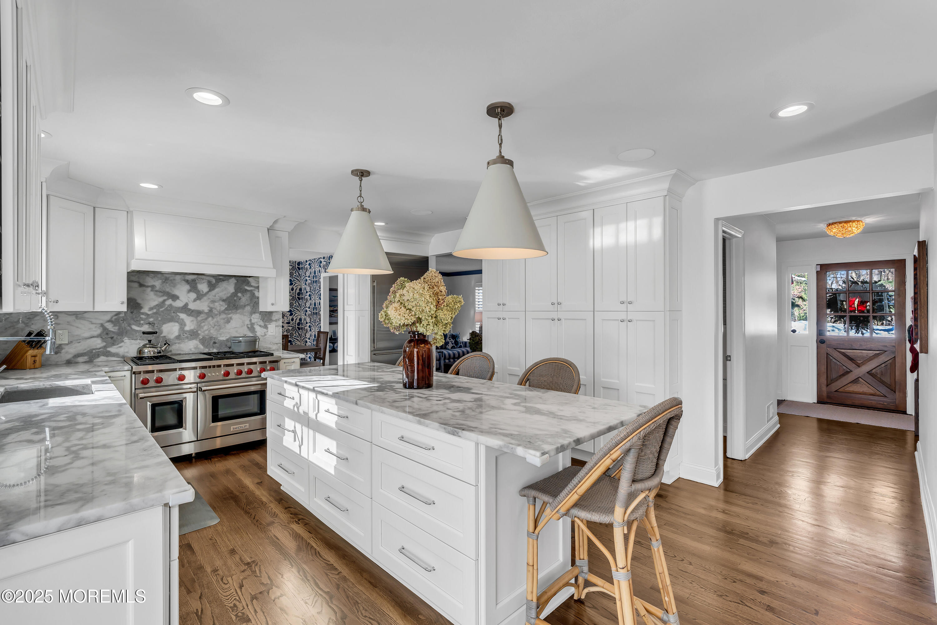91 Lewis Point Road Fair Haven, NJ 07704 - Photo 11 of 58 a kitchen with stainless steel appliances granite countertop wooden cabinets and a stove