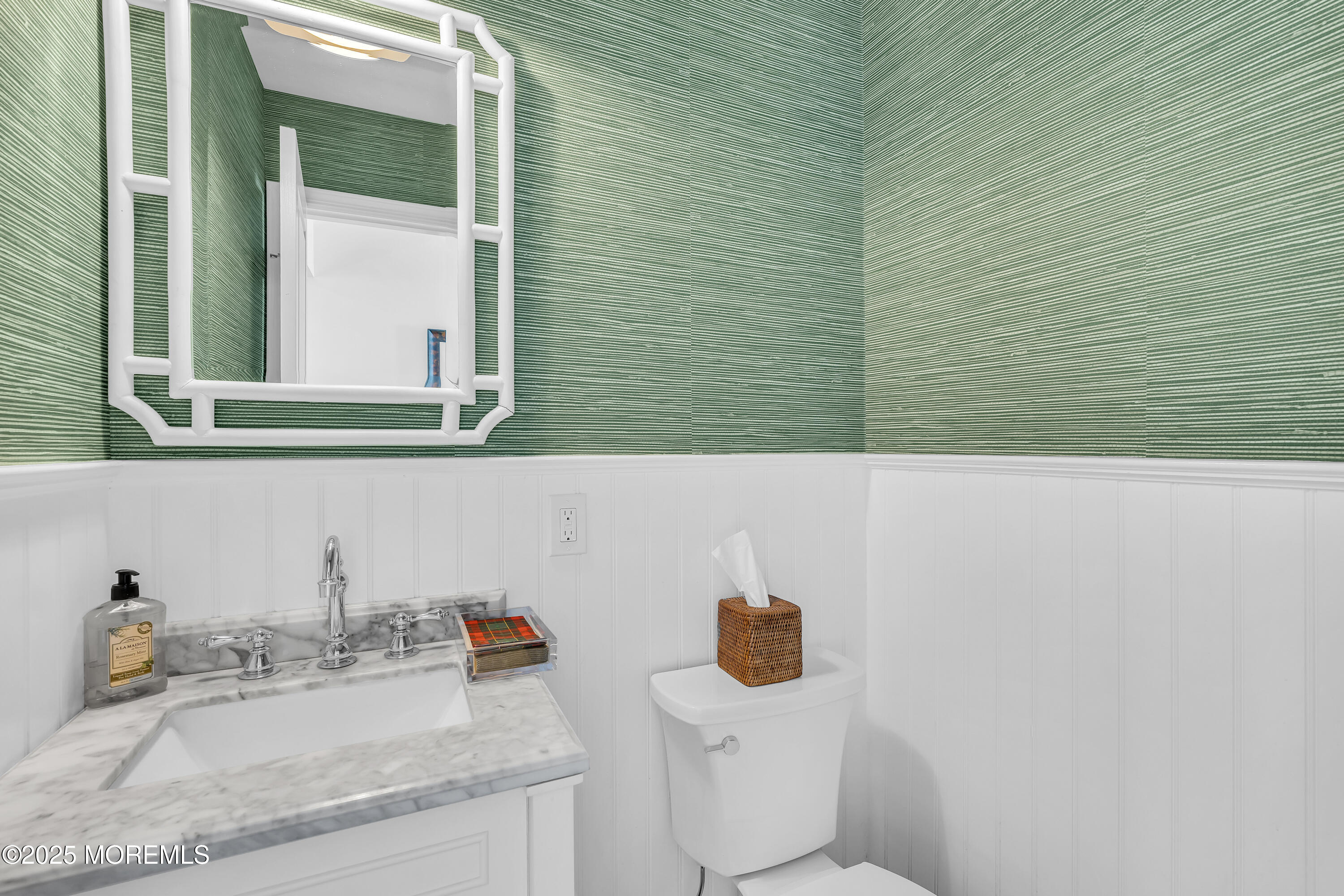 91 Lewis Point Road Fair Haven, NJ 07704 - Photo 25 of 58 a bathroom with a toilet sink and mirror