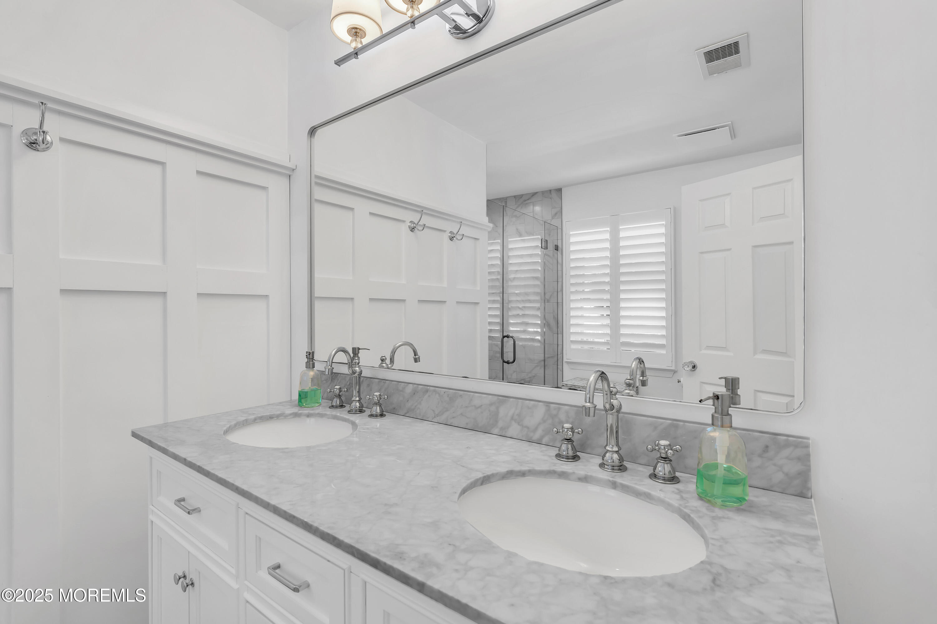 91 Lewis Point Road Fair Haven, NJ 07704 - Photo 30 of 58 a bathroom with a granite countertop sink a mirror and a shower