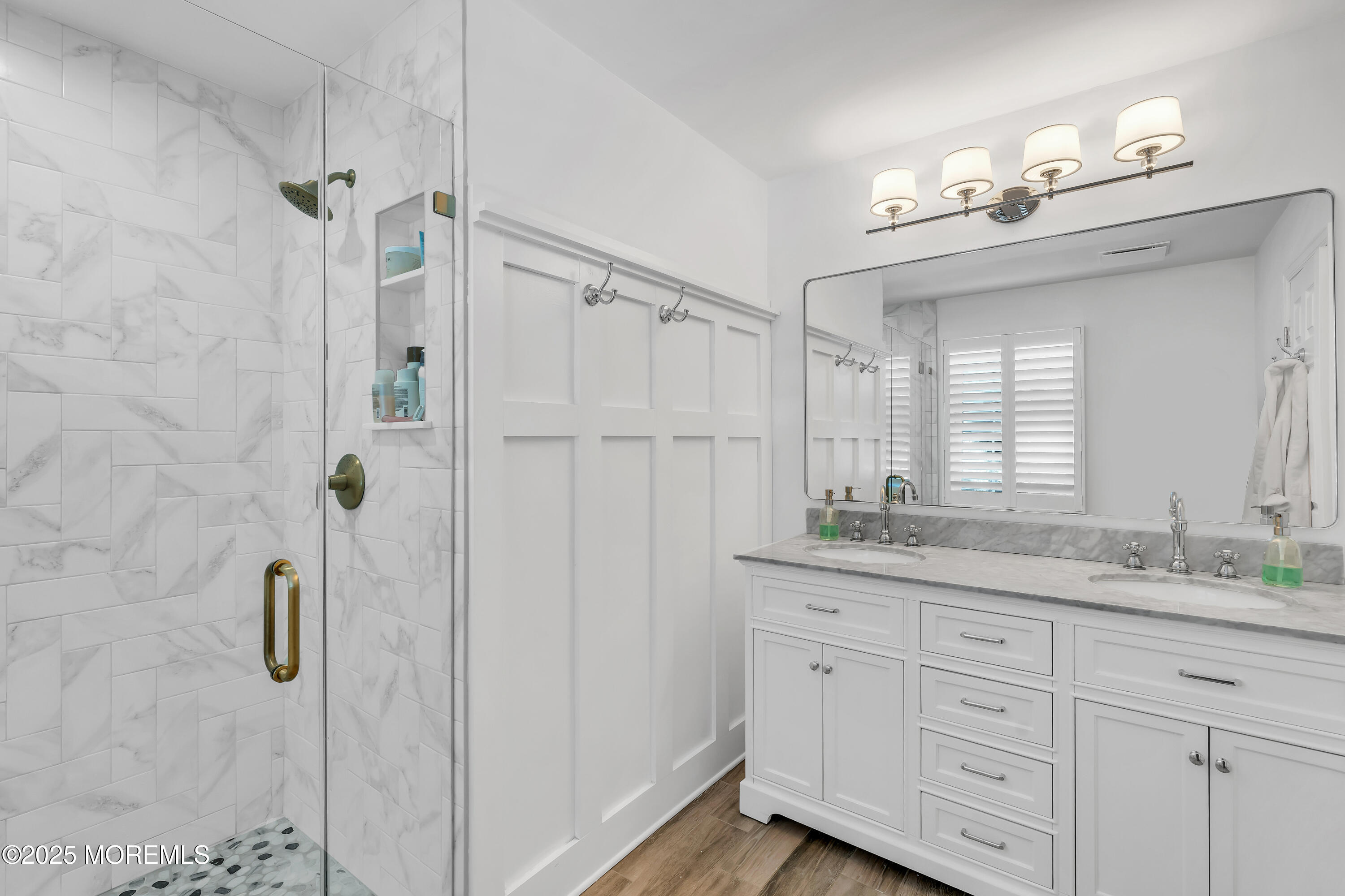 91 Lewis Point Road Fair Haven, NJ 07704 - Photo 31 of 58 a bathroom with a granite countertop sink a mirror a vanity and a shower