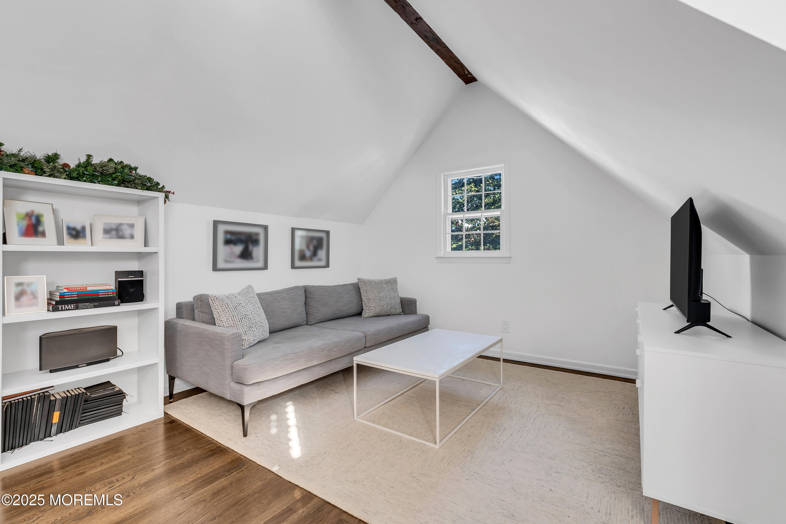91 Lewis Point Road Fair Haven, NJ 07704 - Photo 35 of 58 a living room with furniture and a flat screen tv