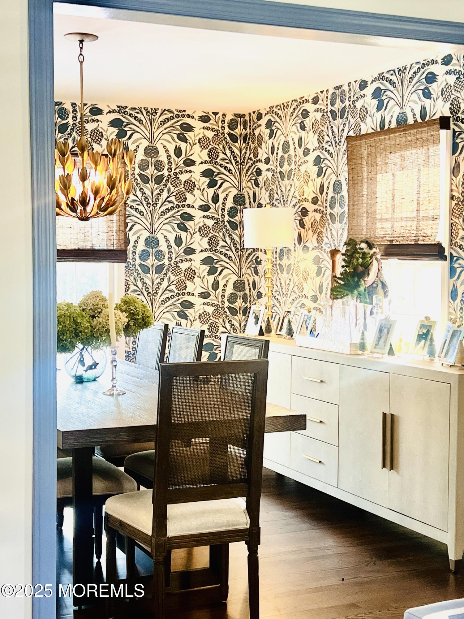 91 Lewis Point Road Fair Haven, NJ 07704 - Photo 51 of 58 a view of a dining table and chairs in wooden floor