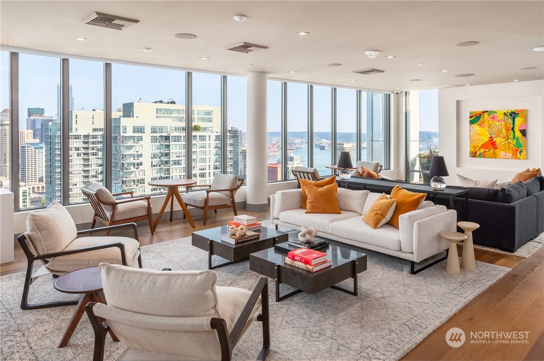 2510 6th Avenue, Unit 2410 Seattle, WA 98121 - Photo 27 of 36 a living room with furniture and a large window