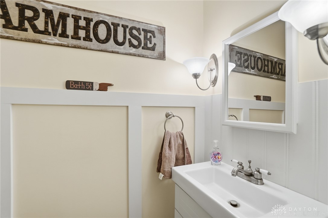 4170 Johnson Road Springfield, OH 45502 - Photo 32 of 54 clean sink, vanity, and board and batten wainscoting.