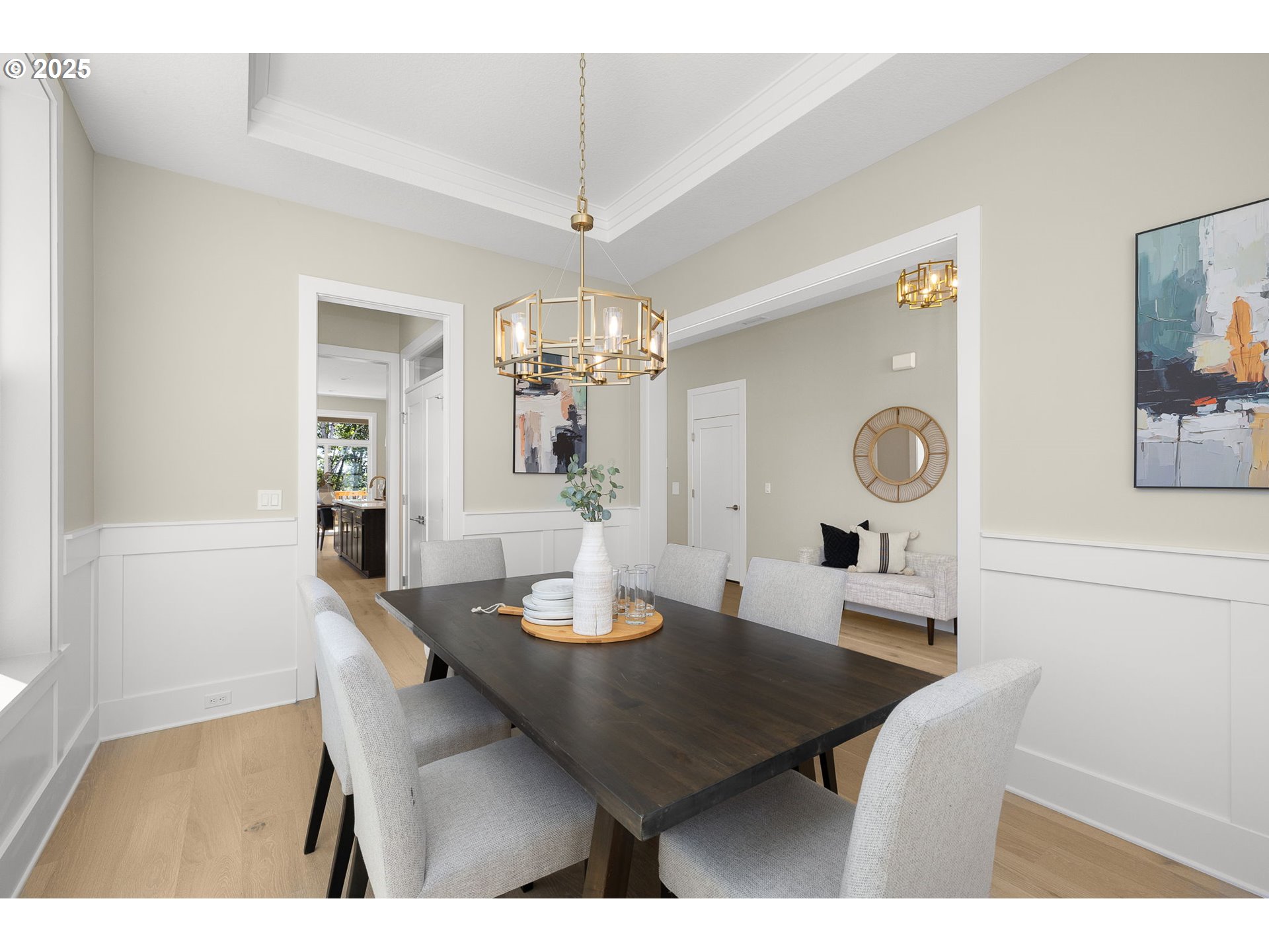 17839 Northwest Layla Drive, Unit LOT 12 Portland, OR 97229 - Photo 15 of 44 a view of a dining room with furniture and chandelier