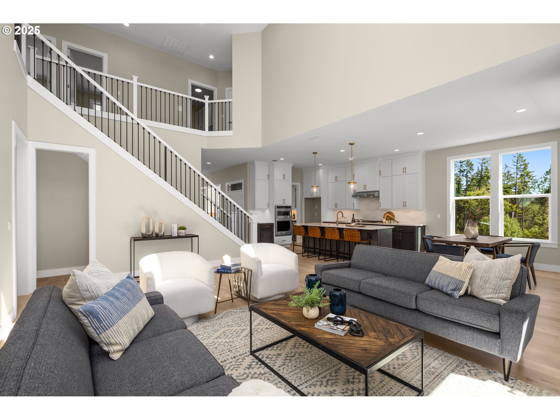 17839 Northwest Layla Drive, Unit LOT 12 Portland, OR 97229 - Photo 2 of 44 a living room with furniture and wooden floor