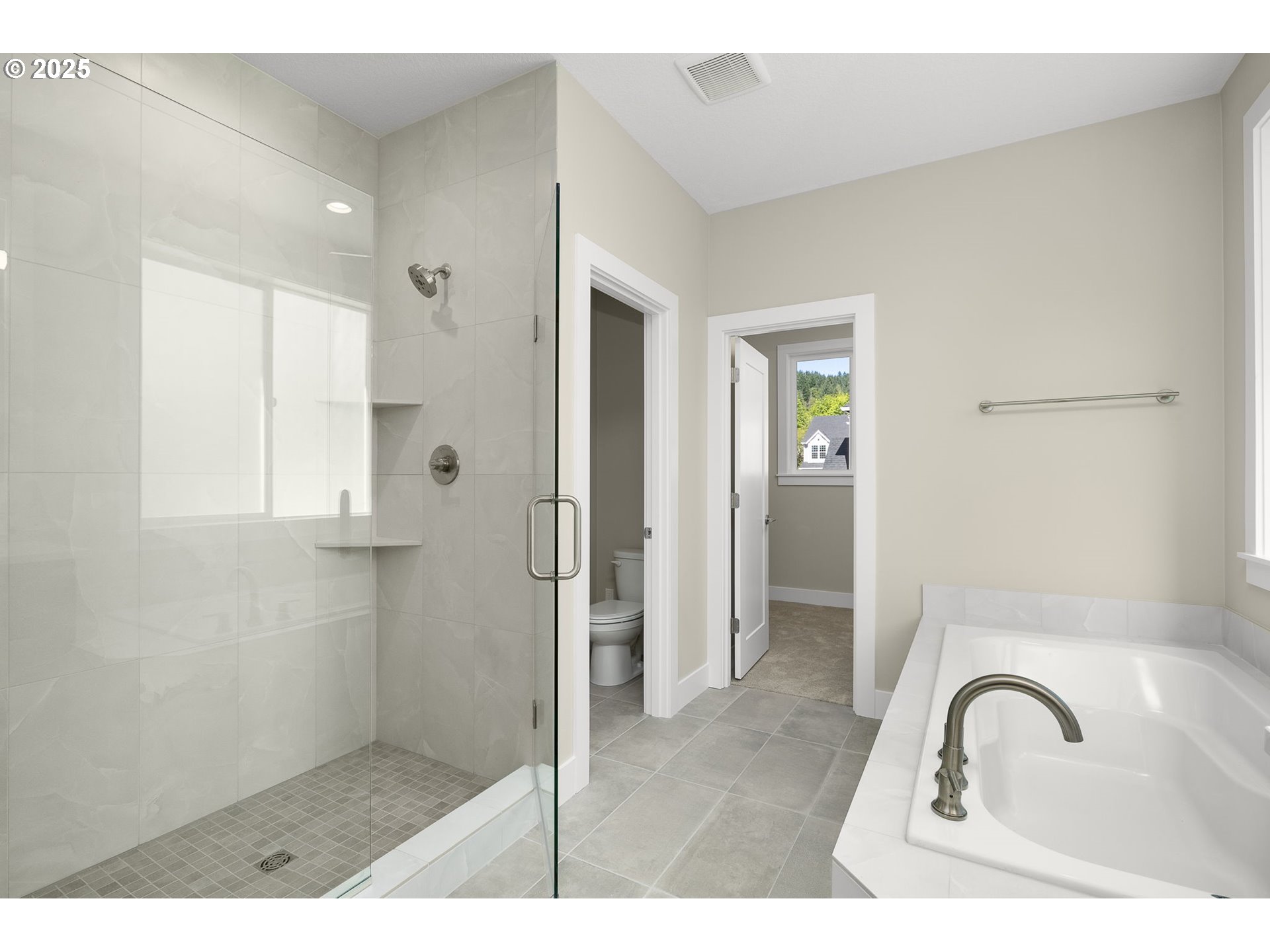 17839 Northwest Layla Drive, Unit LOT 12 Portland, OR 97229 - Photo 27 of 44 a bathroom with a sink and a shower