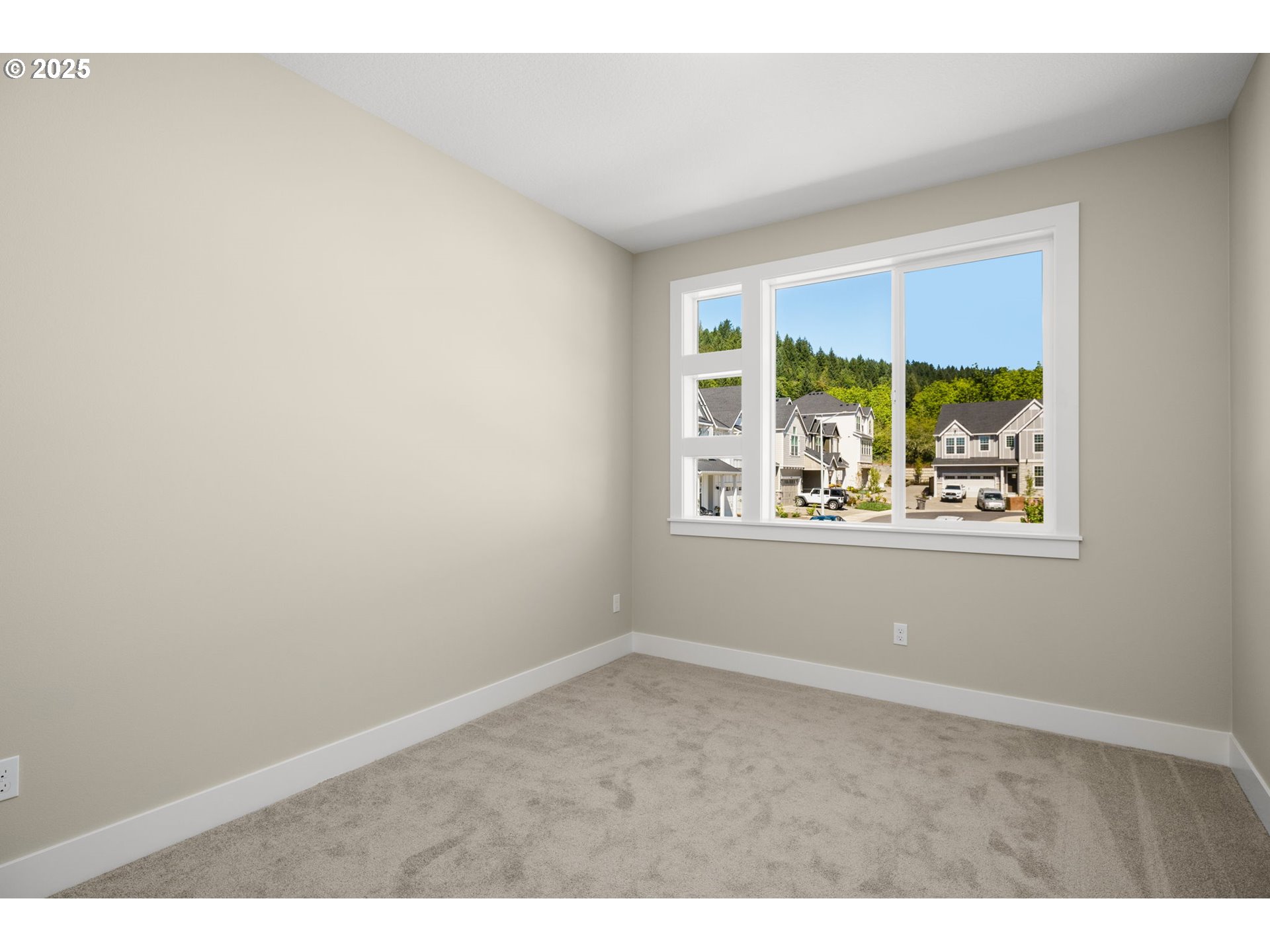 17839 Northwest Layla Drive, Unit LOT 12 Portland, OR 97229 - Photo 29 of 44 an empty room with windows