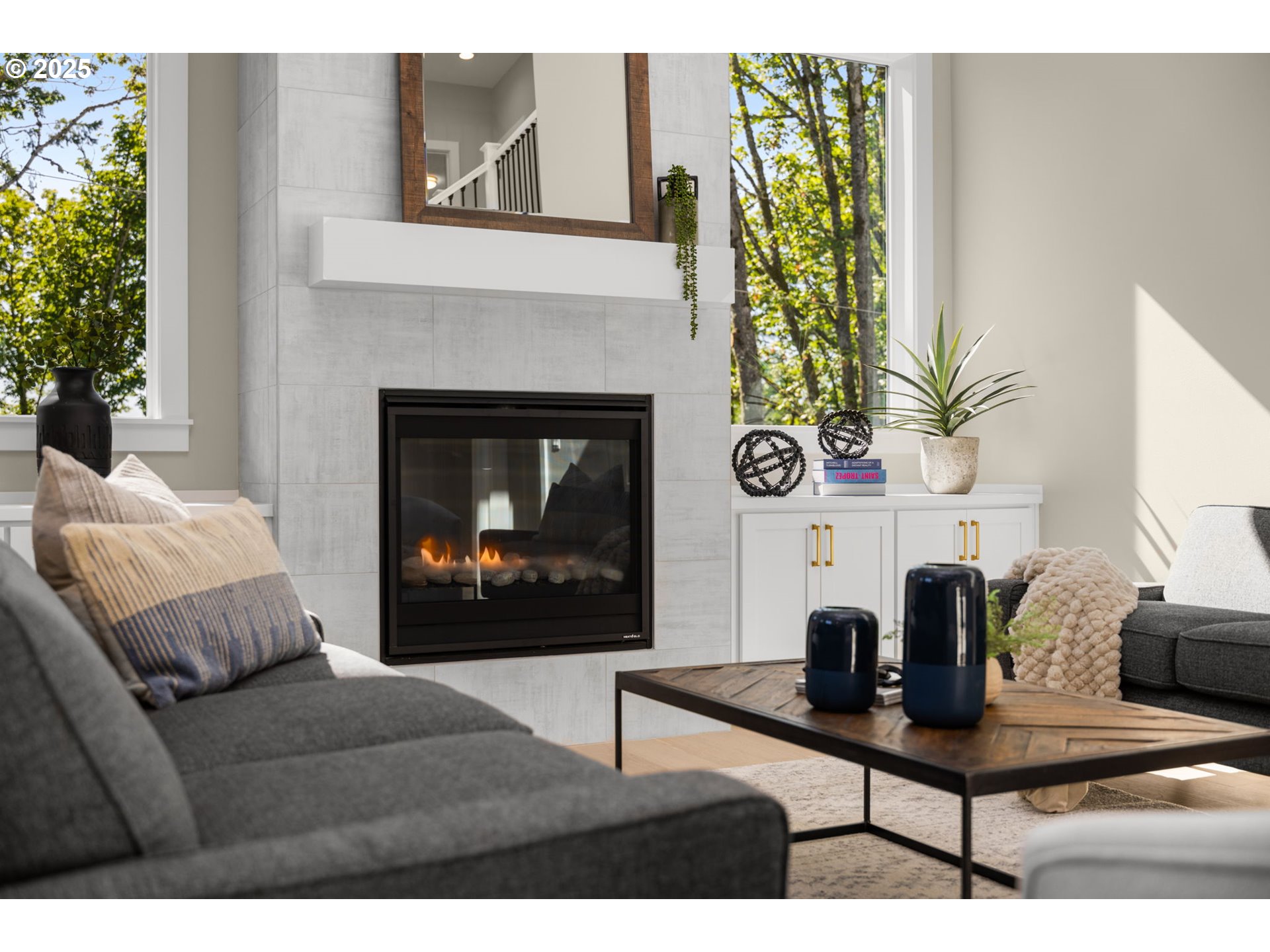 17839 Northwest Layla Drive, Unit LOT 12 Portland, OR 97229 - Photo 3 of 44 a living room with furniture and a fireplace