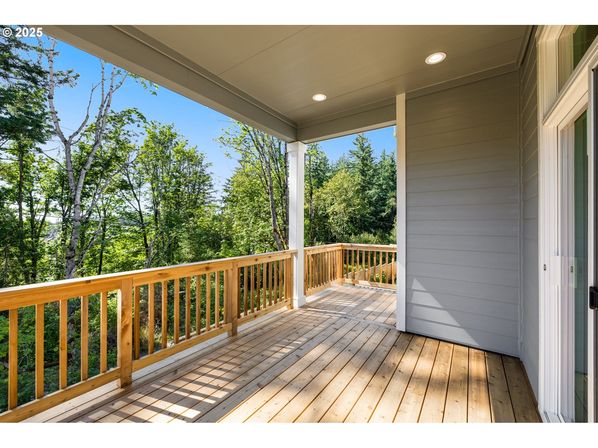 17839 Northwest Layla Drive, Unit LOT 12 Portland, OR 97229 - Photo 36 of 44 a view of balcony with wooden floor