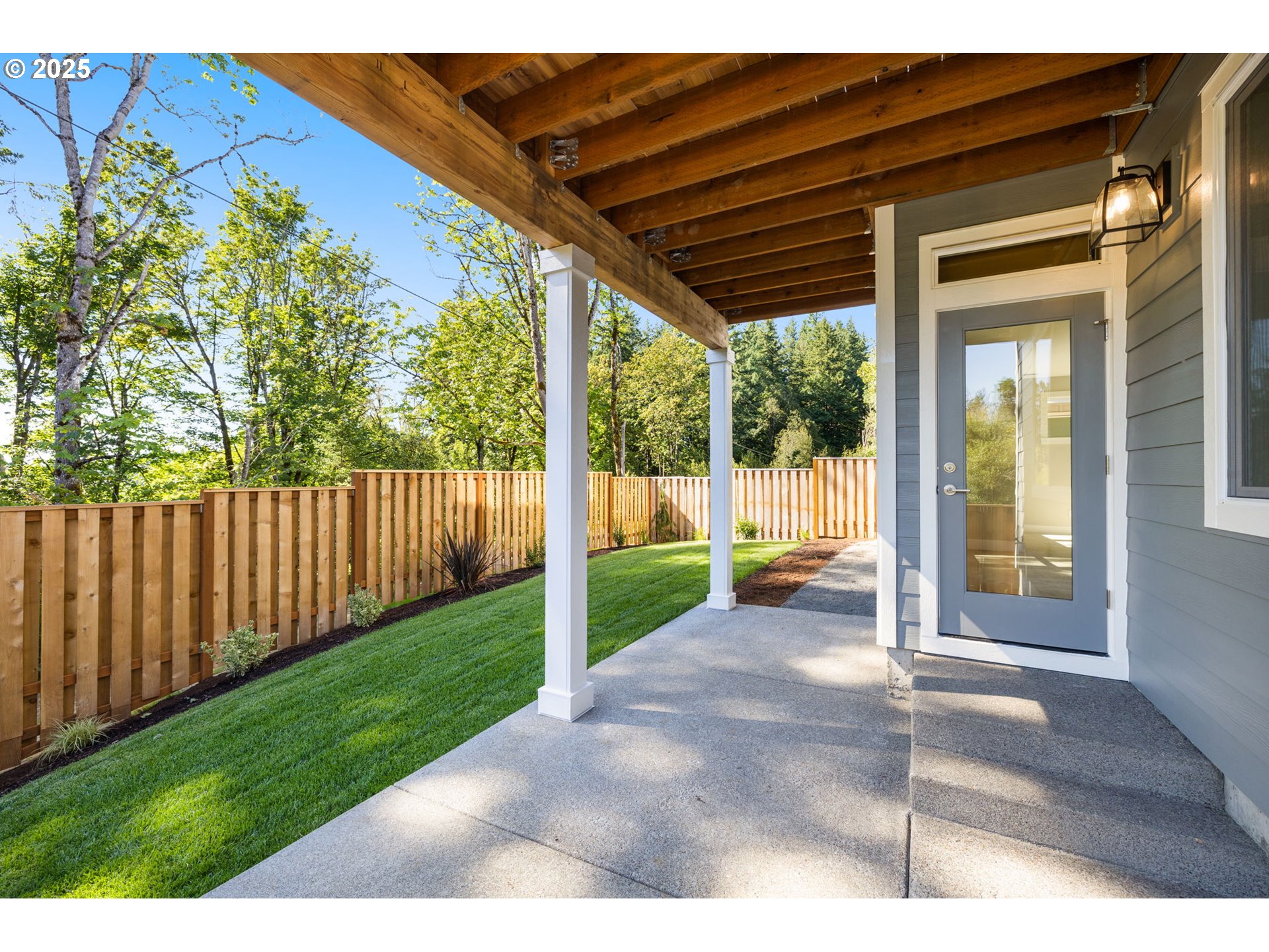 17839 Northwest Layla Drive, Unit LOT 12 Portland, OR 97229 - Photo 37 of 44 a view of porch with a backyard