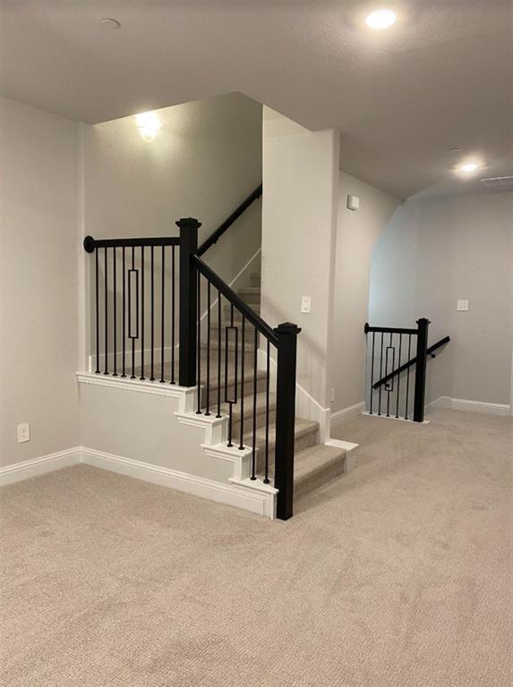 7833 Sunset Boulevard Rowlett, TX 75088 - Photo 9 of 20 a view of staircase with a white door
