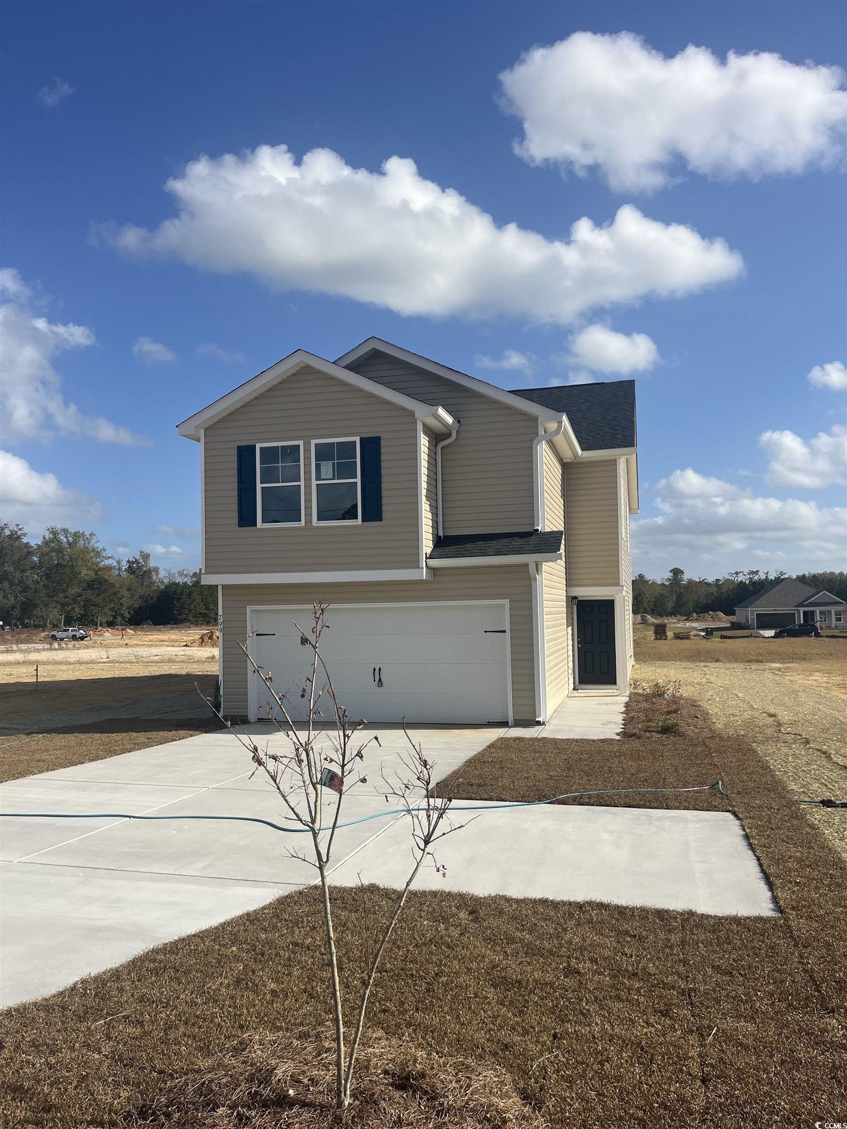 799 Brown Swamp Road Conway, SC 29527 - Photo 1 of 23 View of front facade featuring a garage