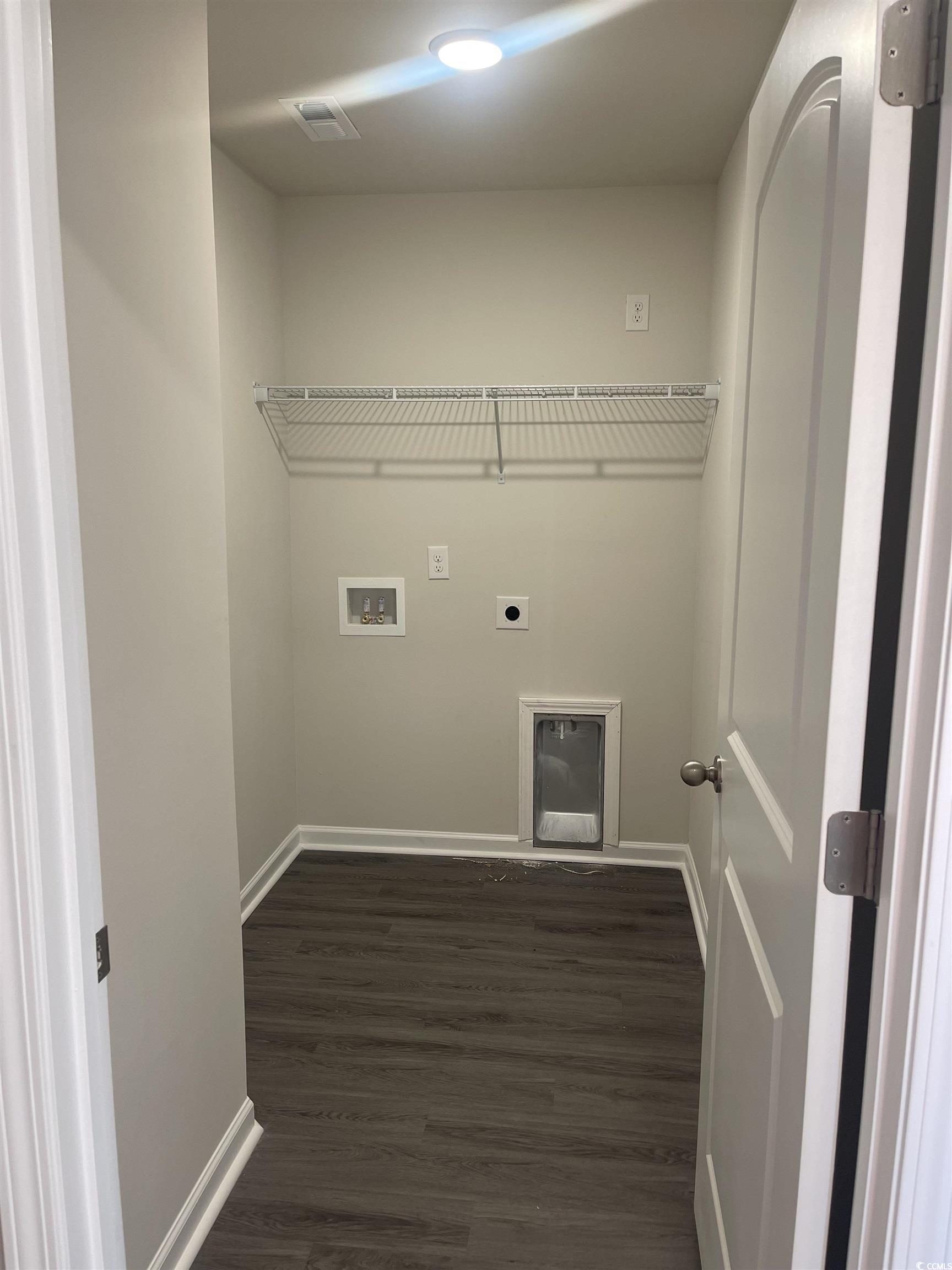 799 Brown Swamp Road Conway, SC 29527 - Photo 12 of 23 Laundry room featuring electric dryer hookup, dark