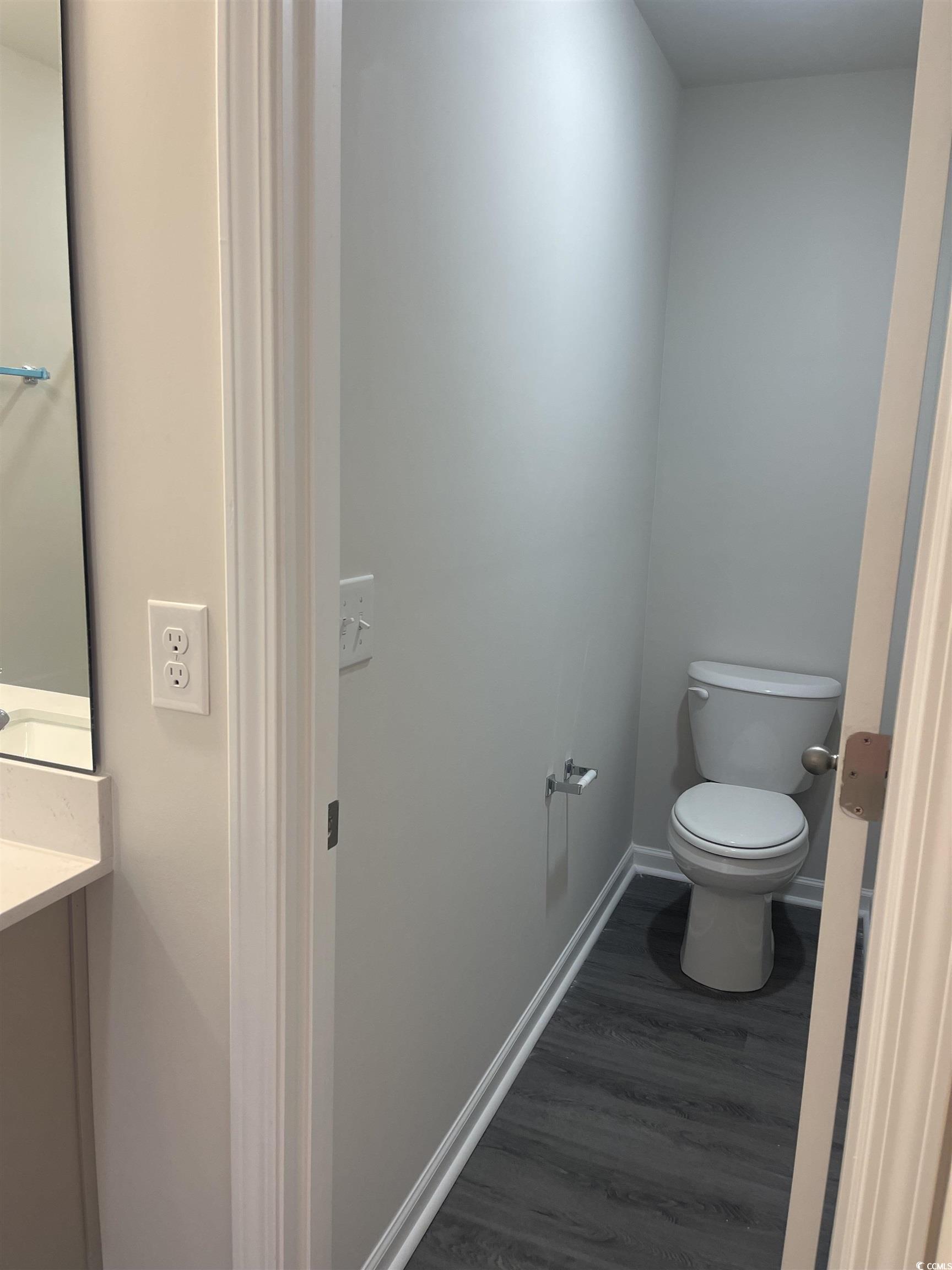 799 Brown Swamp Road Conway, SC 29527 - Photo 14 of 23 Bathroom featuring hardwood / wood-style floors an