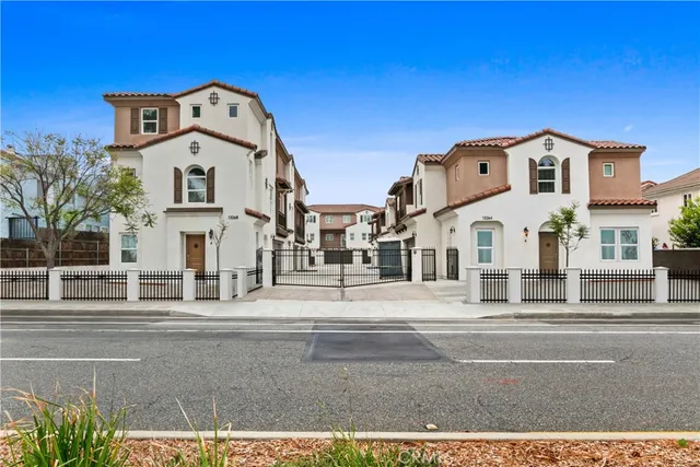 a view of a street in front of a building